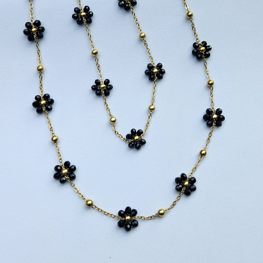 Tya — Collier Ras-de-Cou Fleurs Noires Dorées