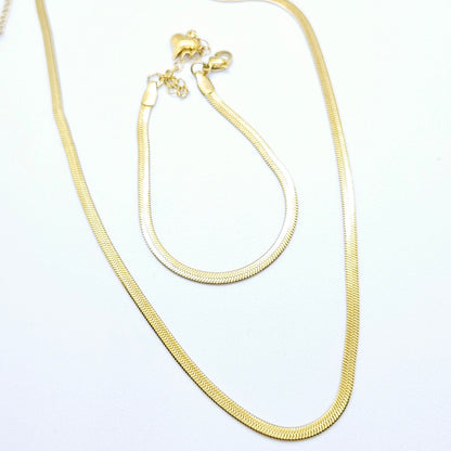 Monoï – Parure Dorée Maille Serpent