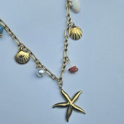 Indira — Collier Multi-Breloques Coquillages Étoile & Pierre
