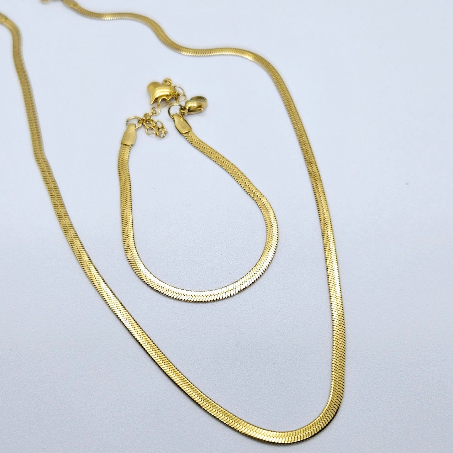 Monoï – Parure Dorée Maille Serpent