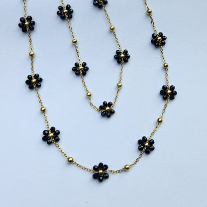 Tya — Collier Ras-de-Cou Fleurs Noires Dorées